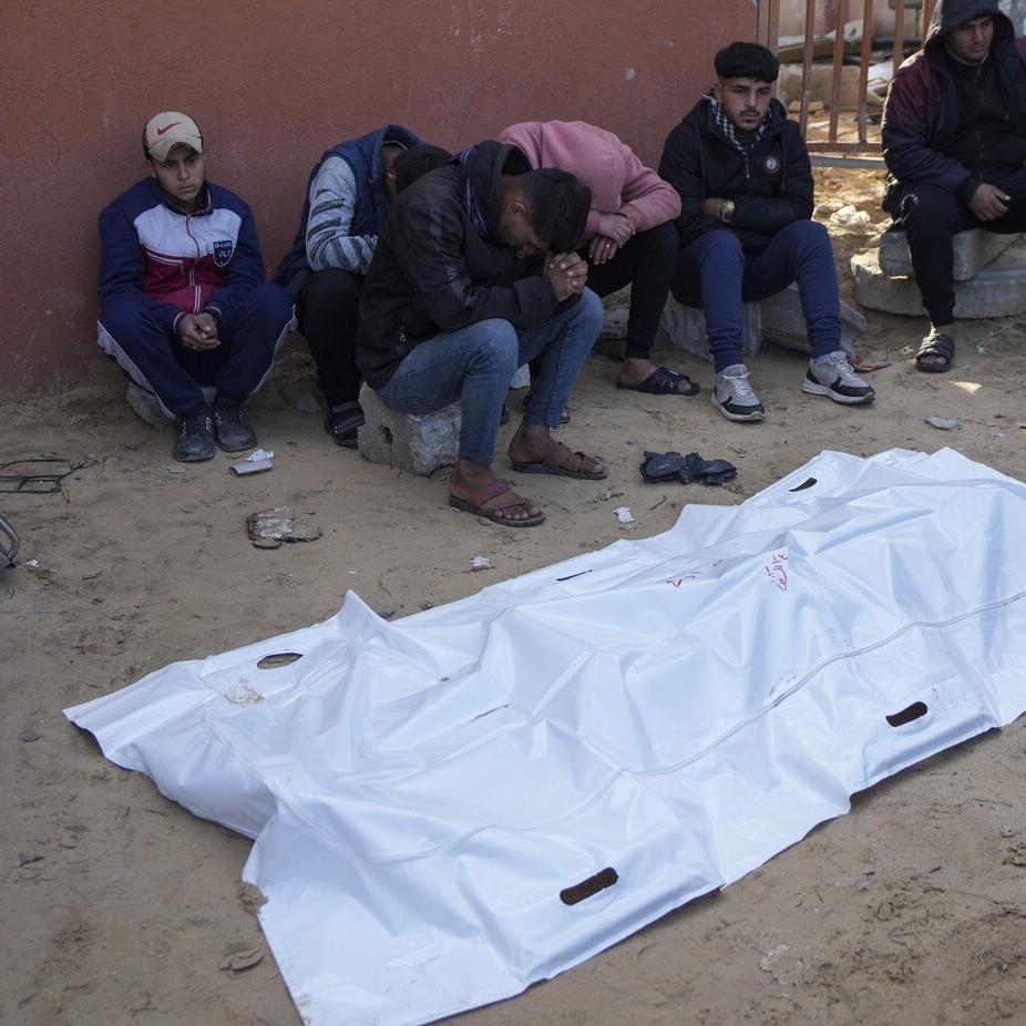 Israeli airstrikes in Gaza kill at least 21, hospital workers say, as talks underway